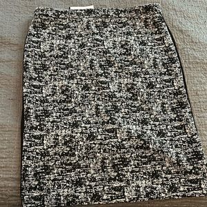 Brand new size 12 Black and White print skirt. Black print on the back.